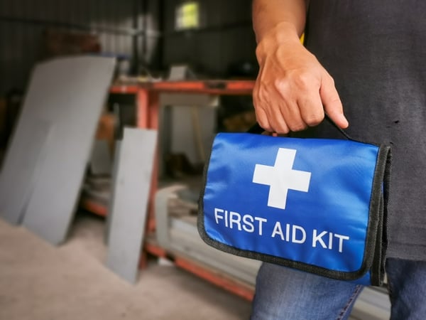 blue first aid kit with worker-1