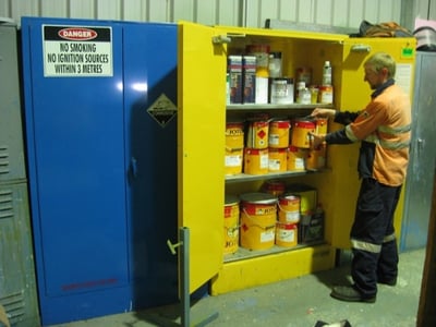 staff using a flammable cabinet