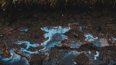 toxic chemical spill in soil outdoors