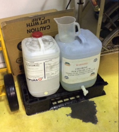 A barrel holding chlorine is leaking liquids.