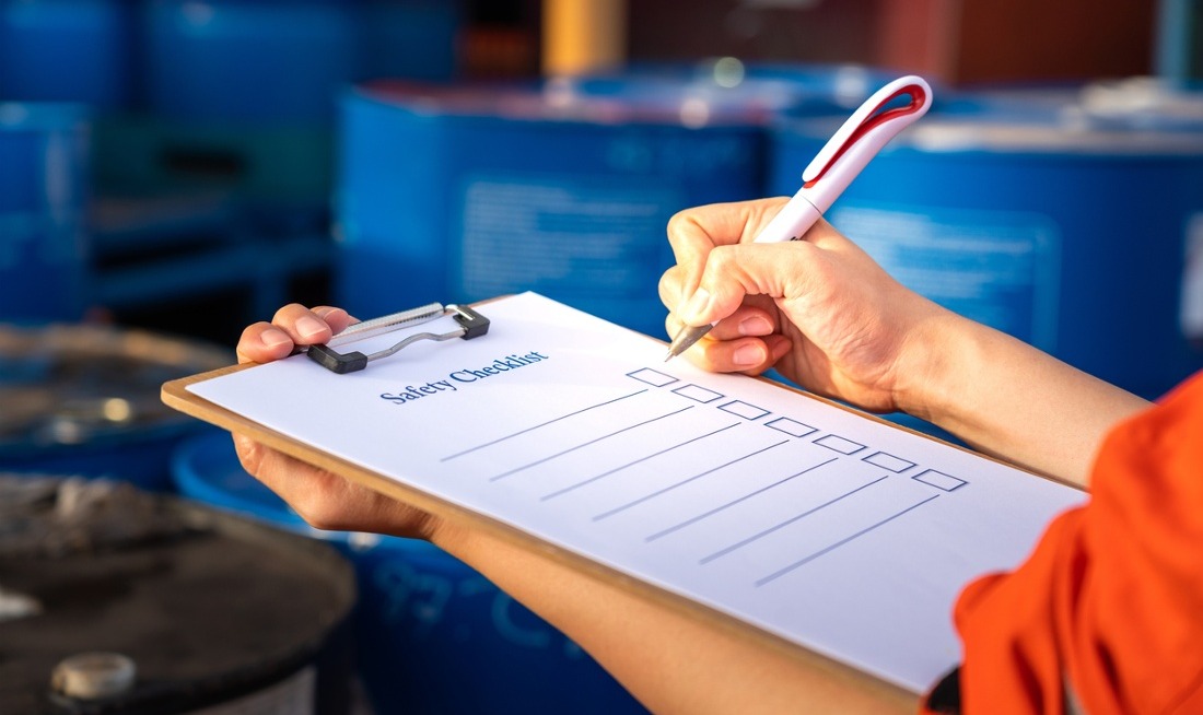 staff member with clipboard in workplace